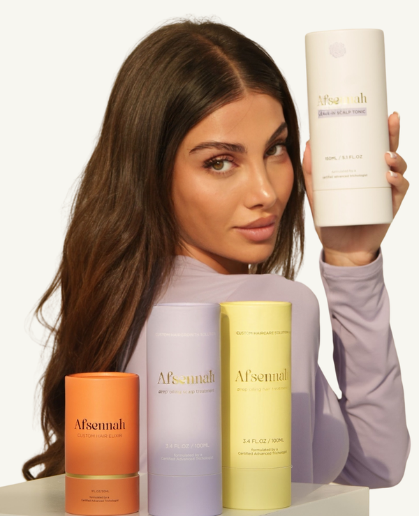 Model holding the Afsennah Ultimate Package