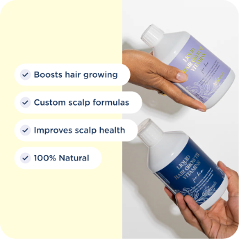 Hand holding the Afsennah Liquid Hair Growth Vitamins for men with its key benefits listed