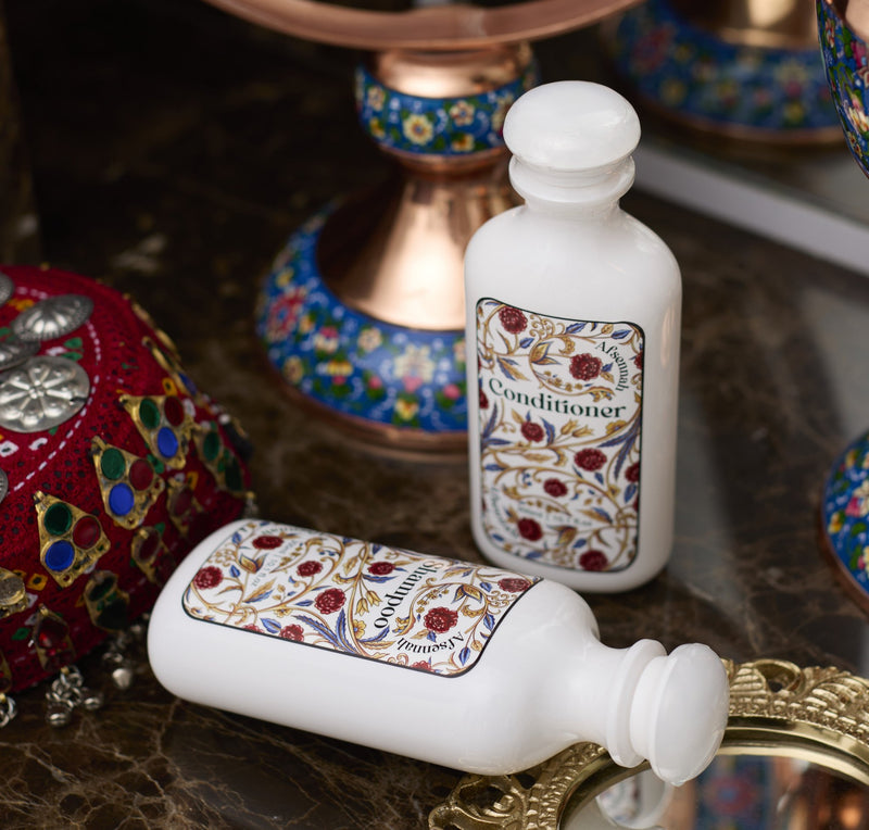 Afsennah custom shampoo and conditioner bottles shown in detail